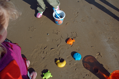 Sandkuchenf&ouml;rmchenrandstempelabdr&uuml;ckeoderso